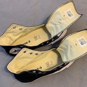 High top ‘chucks’ no laces. Used once for NYC teen photo shoot. Size 8W - 6M